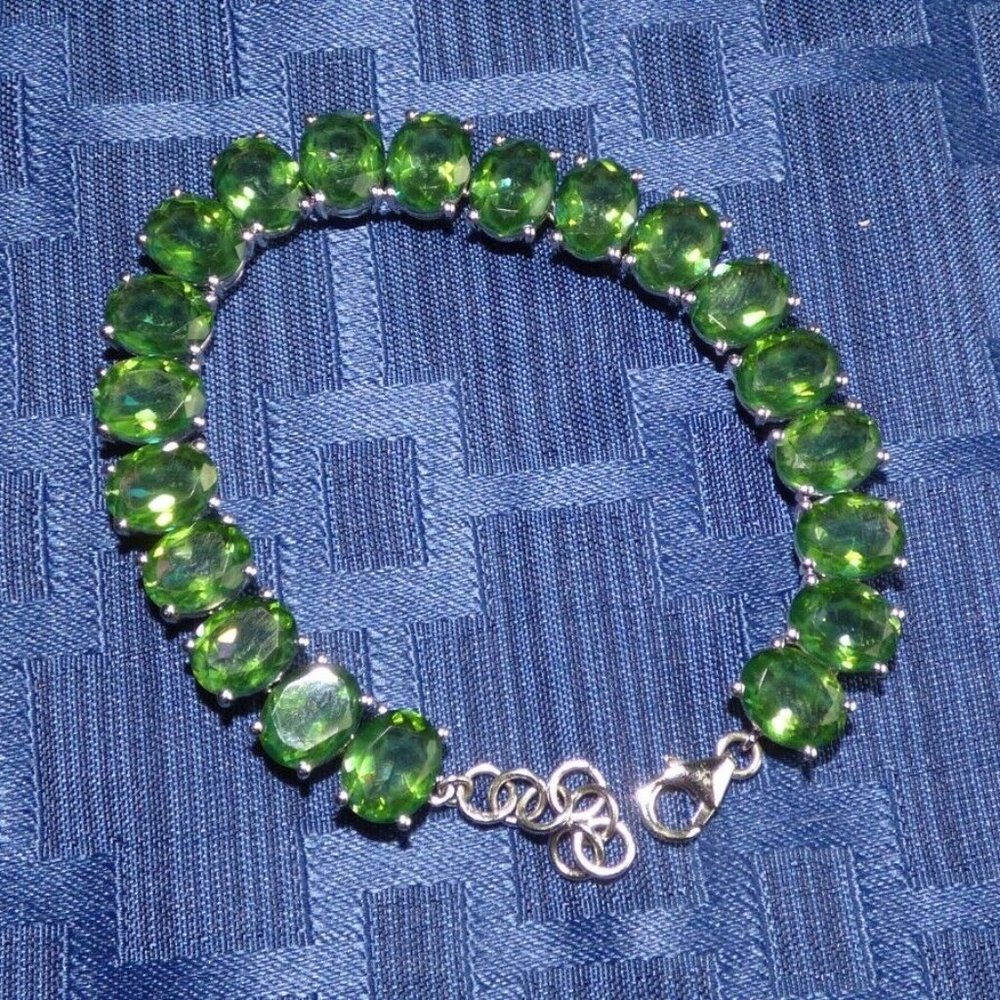 52.46CTS FERN GREEN QUARTZ 8MM X 10MM STERLING SILVER BRACELET LE 70